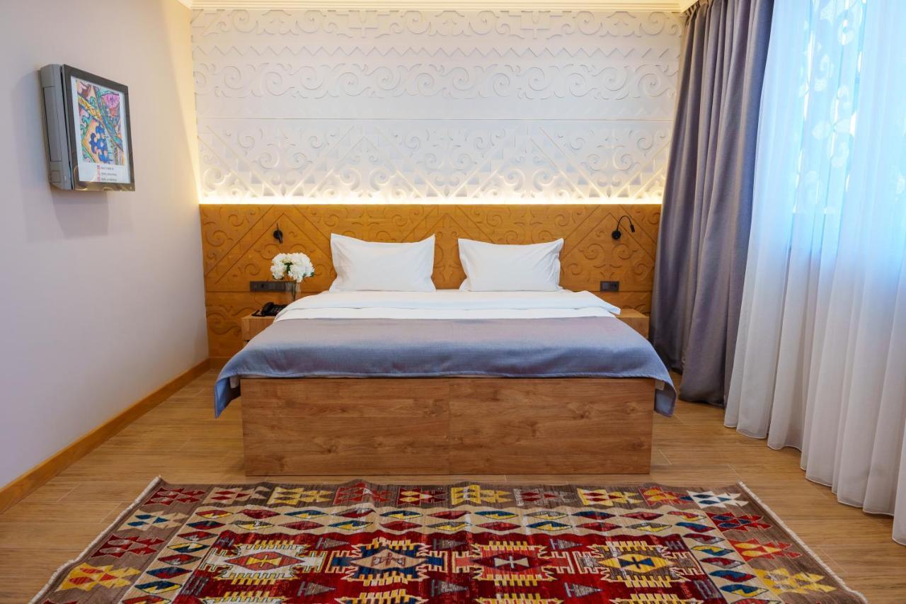 Dami Almaty Hotel エクステリア 写真