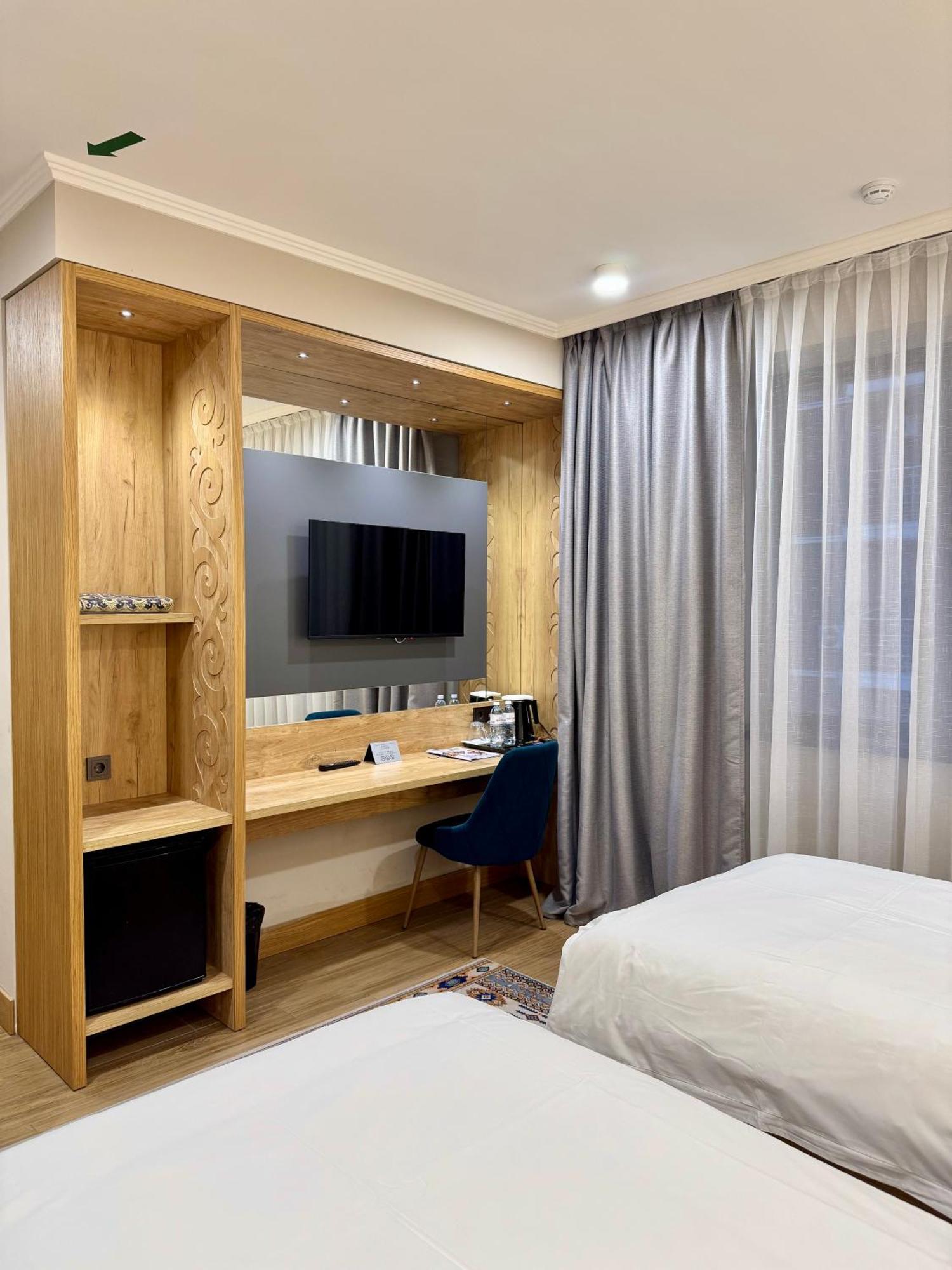 Dami Almaty Hotel エクステリア 写真